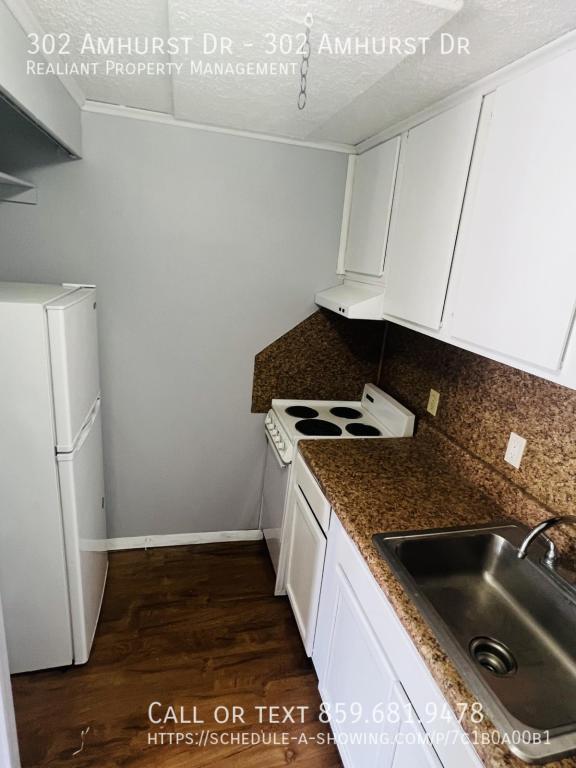 Building Photo - Amhurst Apartments, 302 Amhurst Dr