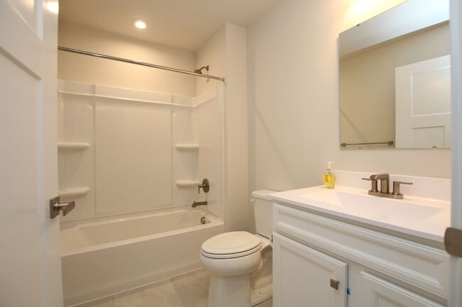 Building Photo - Maintenance Free Living in this Brand New ...