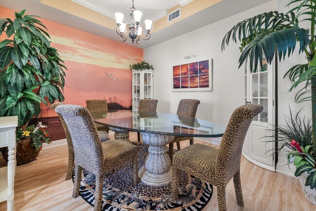 Building Photo - Experience Bell Tower Park. GATED ground floor 2 Bed 2 Bath Den 1 Car Garage Condo.