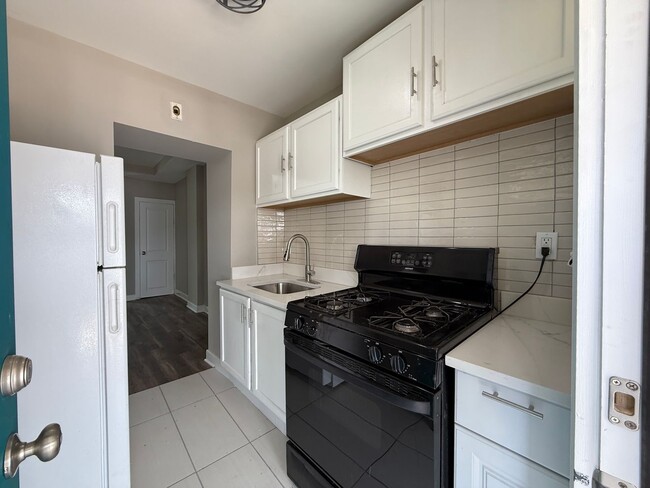 Building Photo - Renovated 2BR Home with Finished Basement ...
