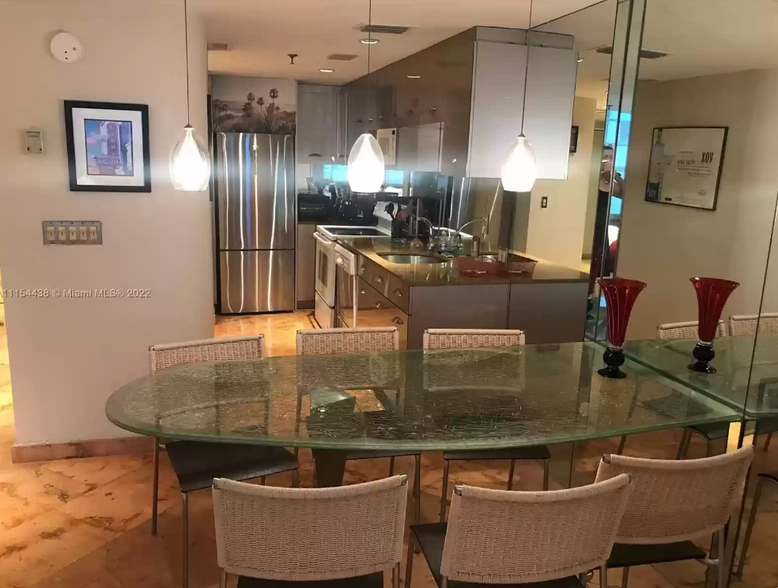 Kitchen and dining area - 100 Lincoln Rd