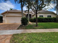 Building Photo - 5145 NW 51st Ct