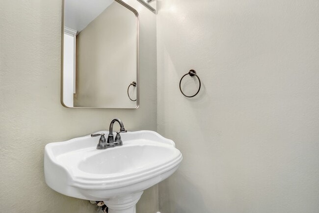 Building Photo - Well, maintained 3-bedroom, 2.5 bath corner unit town home in a private, gated community!