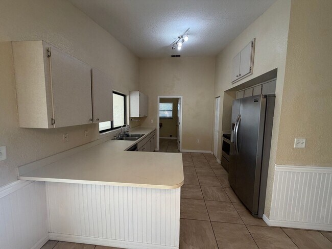 Building Photo - Spacious Open-Concept Home with Bonus Patio & Fenced Yard