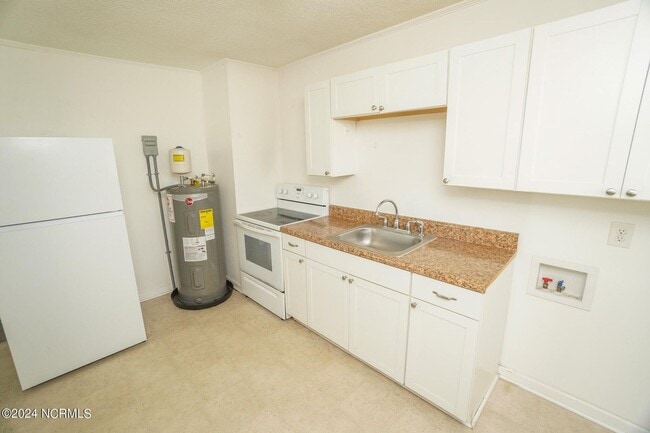 Building Photo - Lawn Care Included in Jville City Limits!