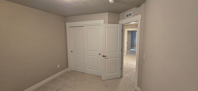 Building Photo - Come check out this beautiful 3 story town...