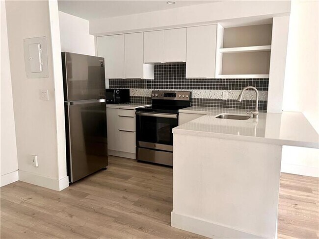 Building Photo - 10930 Royal Palm Blvd