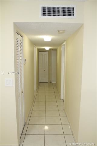 Building Photo - 4680 NW 102nd Ave  104-20