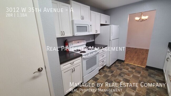 Building Photo - 3012 W 35th Ave