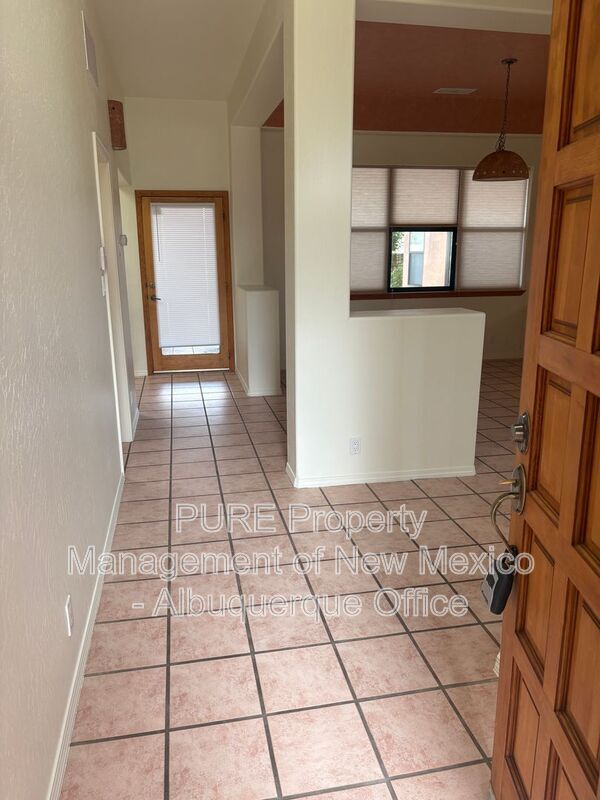 Building Photo - 8220 W Raintree Dr NE