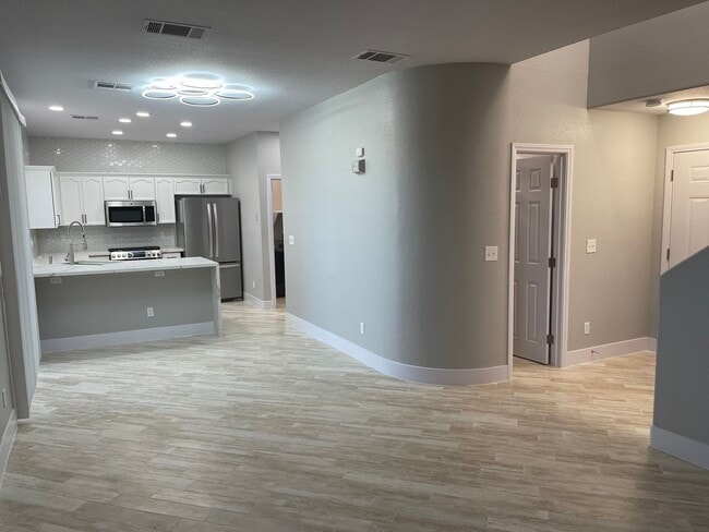 Building Photo - **GORGEOUSLY REMODELED & CLEAN!!  3BD-2 1/2BA HOME IN SILVERADO RANCH !!  *** ONLY $2,190 ***