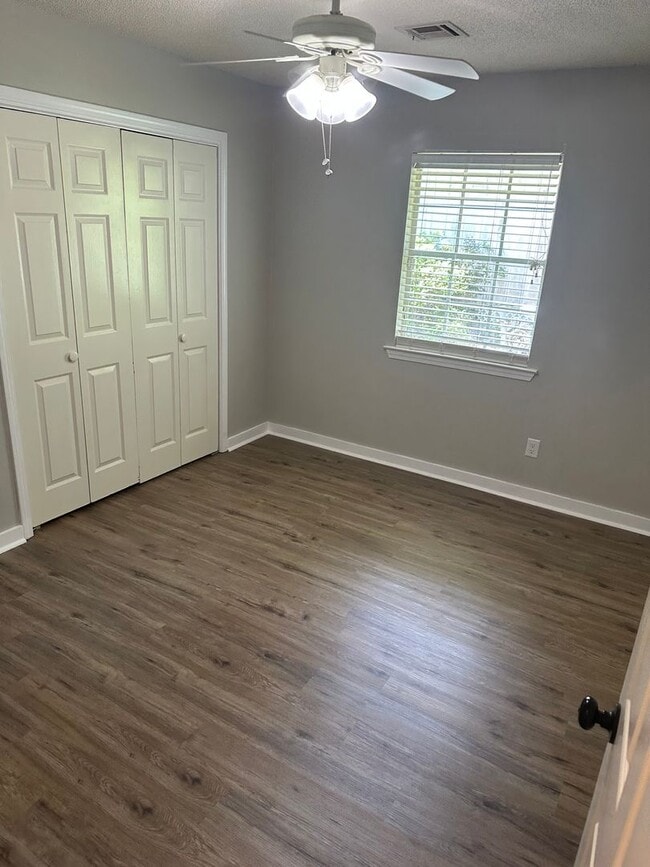 Building Photo - All New Flooring Throughout!