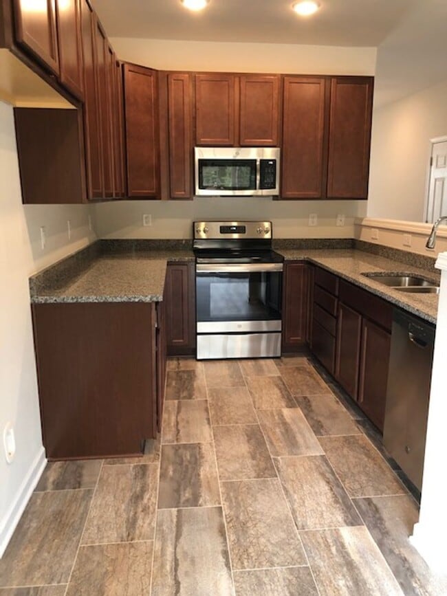 Building Photo - COMING SOON! Beautiful 3BR 2.5BA TownHouse w/ In-Unit Laundry • Garage Parking • Stainless Kitche...