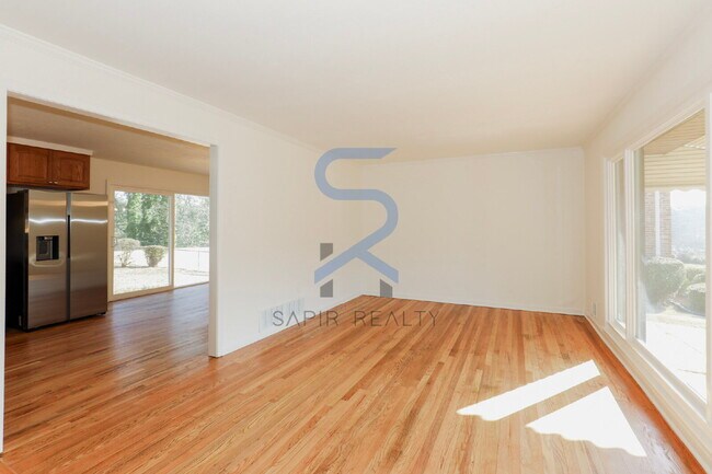 Building Photo - Move in before February 15th and choose your reward: a $250 Amazon Gift Card or a 55" Smart TV!