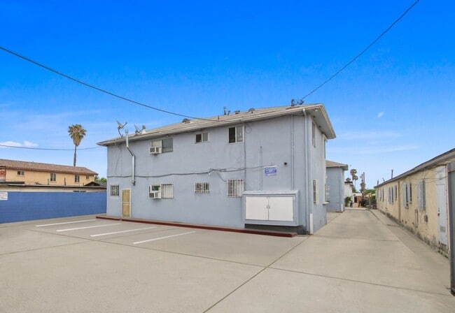 Building Photo - 6211 10th Ave