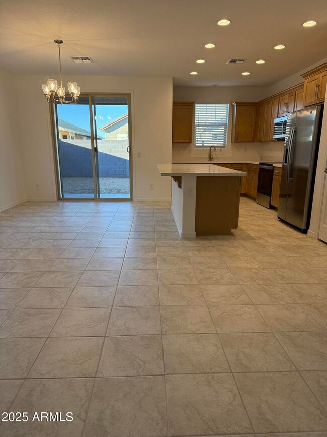 Building Photo - 9960 W Mitchell Ave