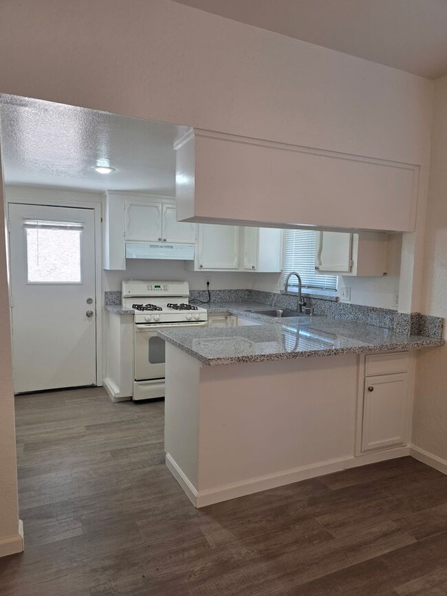 Building Photo - 3BR Home + Detached Studio / Guest Space on Large Lot with Storage!