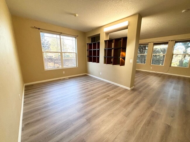 Building Photo - Stunning Remodeled Home with Office, A/C, Fenced Yard & Flexible Living Space!