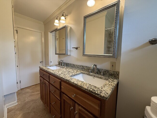 Building Photo - Modern Comforts with Granite & Hardwood Finishes!" 3 Bedroom 2 bath home.