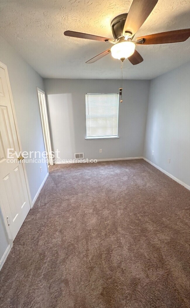 Building Photo - 4 Bed, 2.5 Bath Home with Carport / Available Now!