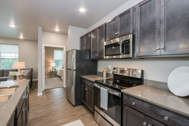 Building Photo - Spacious 2-Bedroom/2-Bath, END unit on first floor, available 8/1/2026