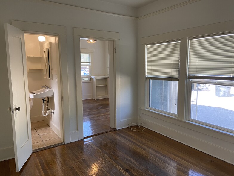 Bedroom toward bath and living room - 209 N Tyndall Ave