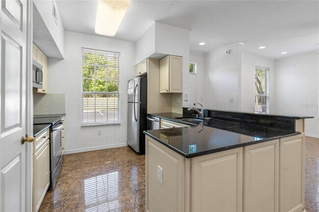 Building Photo - 9158 Lake Chase Island Way