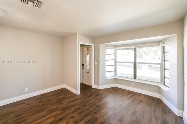 Building Photo - 5801 Royal Palm Blvd