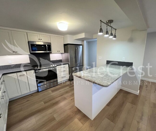 Building Photo - Lovely Two-Bedroom Condominium Located in ...