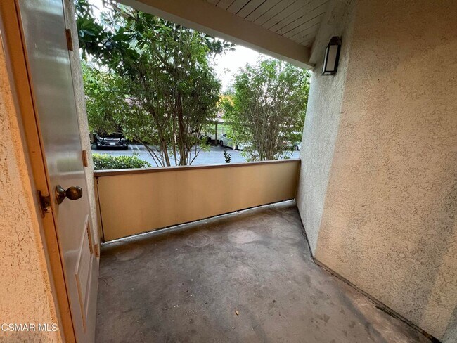 Building Photo - Welcome to this beautifully situated first-floor end unit