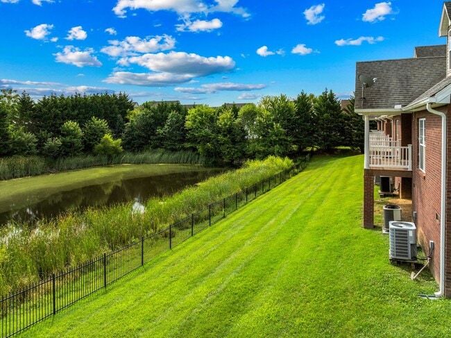 Building Photo - Move-in special. Main-Level Living End-Unit Townhome