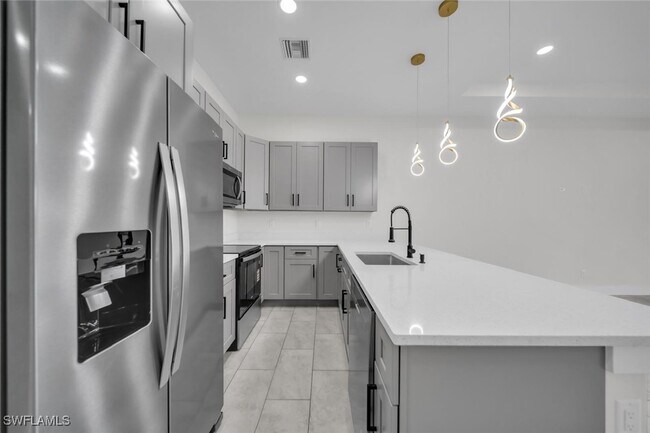 Building Photo - 4833-4835 Leonard Blvd S