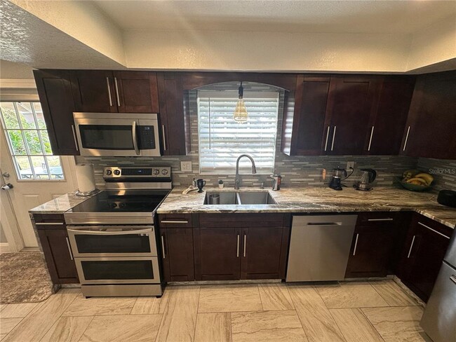 Building Photo - 7327 Floral Cir E