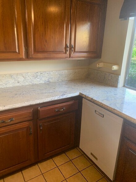 Building Photo - 11004 Tinker Ave