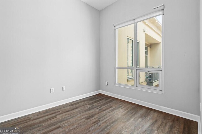 Building Photo - 711 Cosmopolitan Dr NE