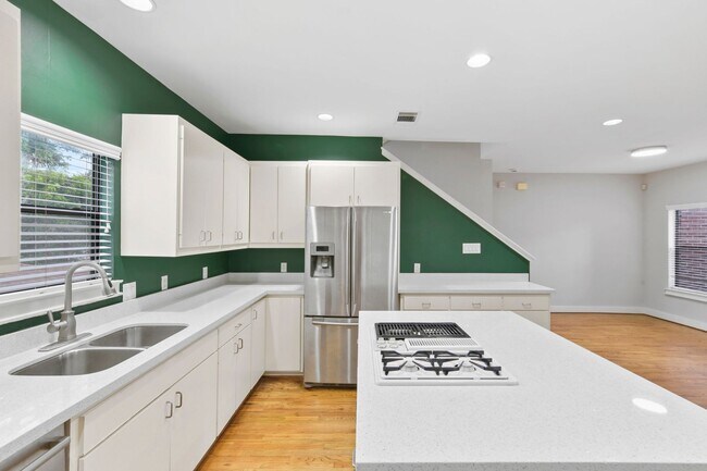 Building Photo - Stunning Rice Military Rental – Gated, Spa...