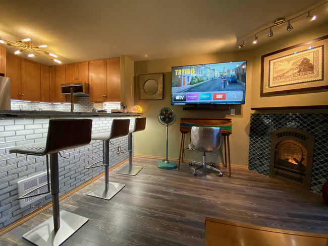 Kitchen and living room with 4K TV, sounder, Apple TV - 3435 California Ave SW