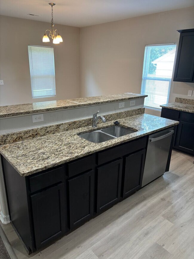 Building Photo - Newly Renovated Four Bedroom Home In North...