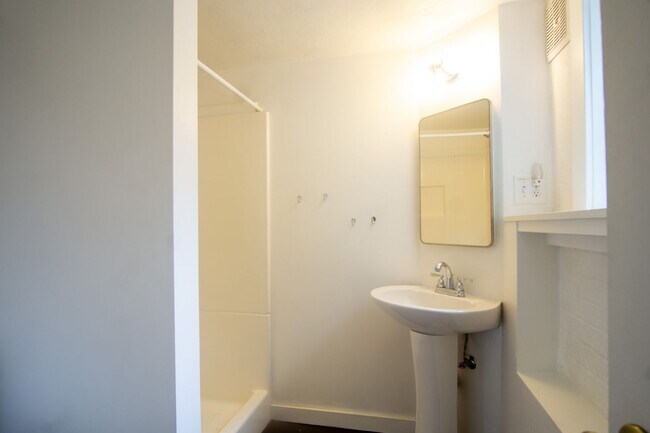Building Photo - Amazing Find! Spacious Daylight Basement Studio with Loads of Character!