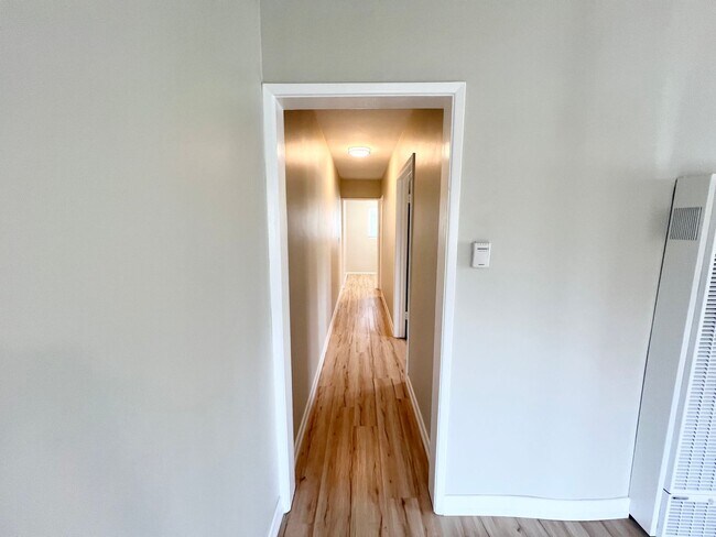 Building Photo - Top-Floor Urban Retreat in the Heart of Do...