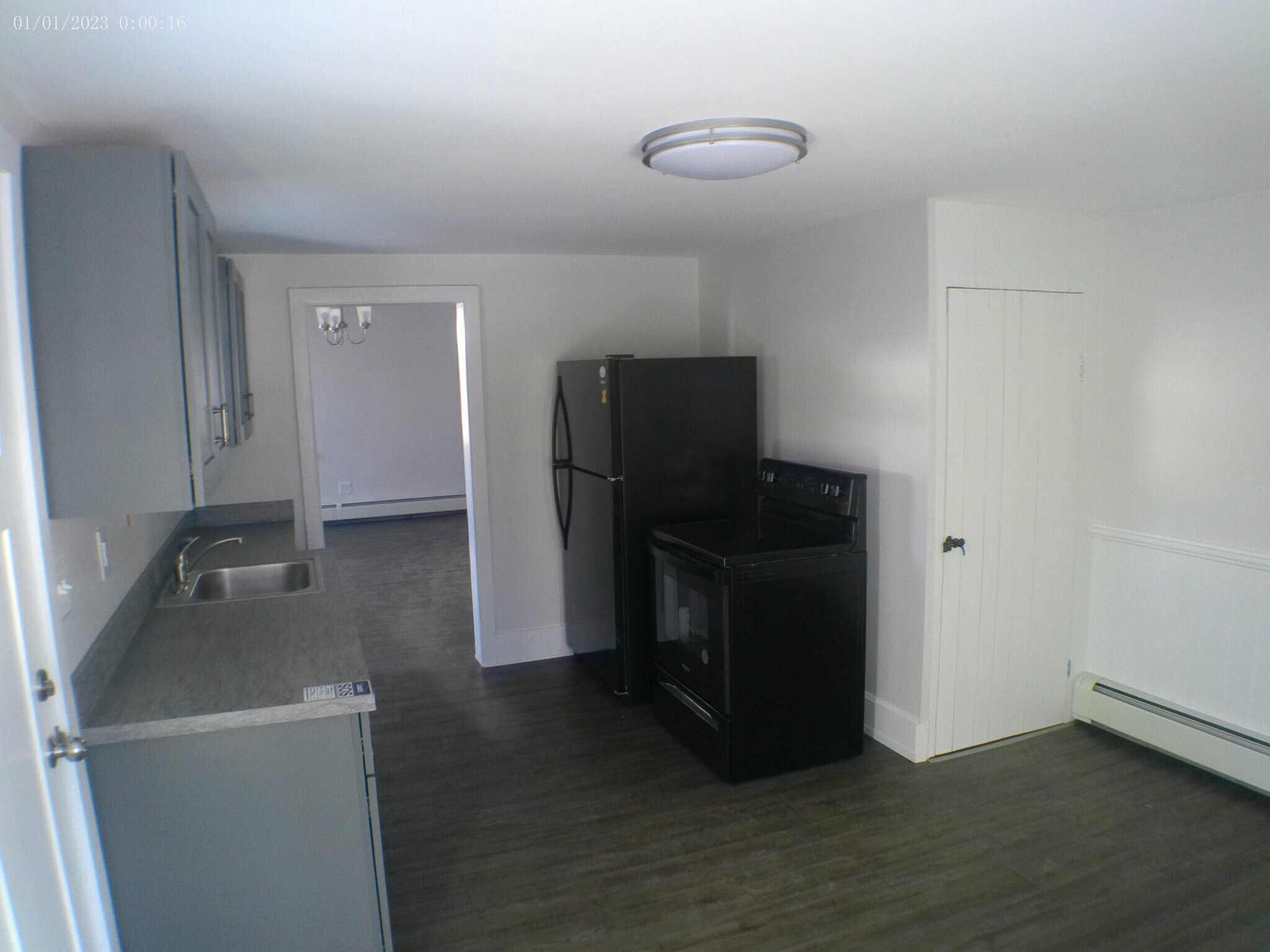 Kitchen with Large walk-in pantry with shelving. Storage available in basement. - 35 Main St