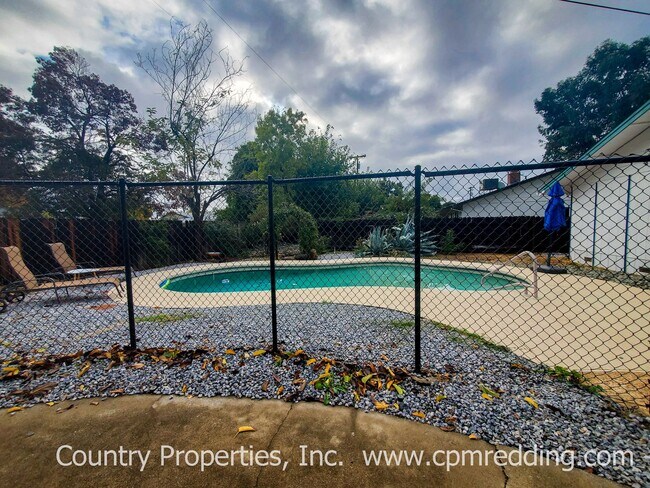 Building Photo - Spacious 3-Bedroom House with Gated Pool i...