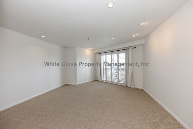 Building Photo - Ocean View Condo Just Steps from Main Street & the Beach – 3 Balconies, Gated Community, Pool & P...