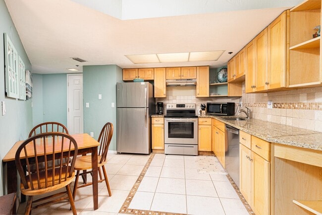 Building Photo - Oceanfront Living in Daytona Beach Shores — The World’s Most Famous Beach!