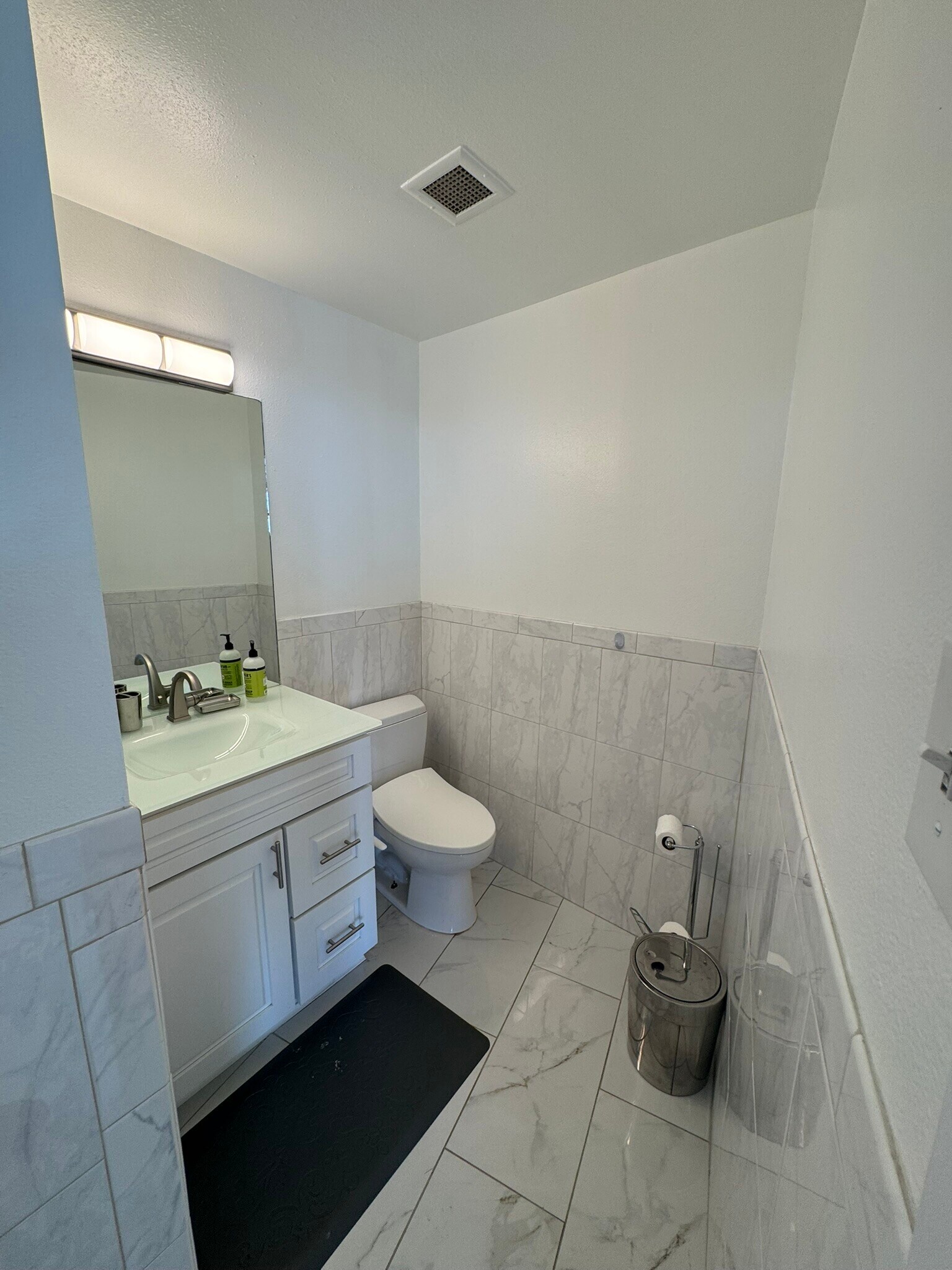 Guest restroom includes bidet. - 700 E Ocean Blvd