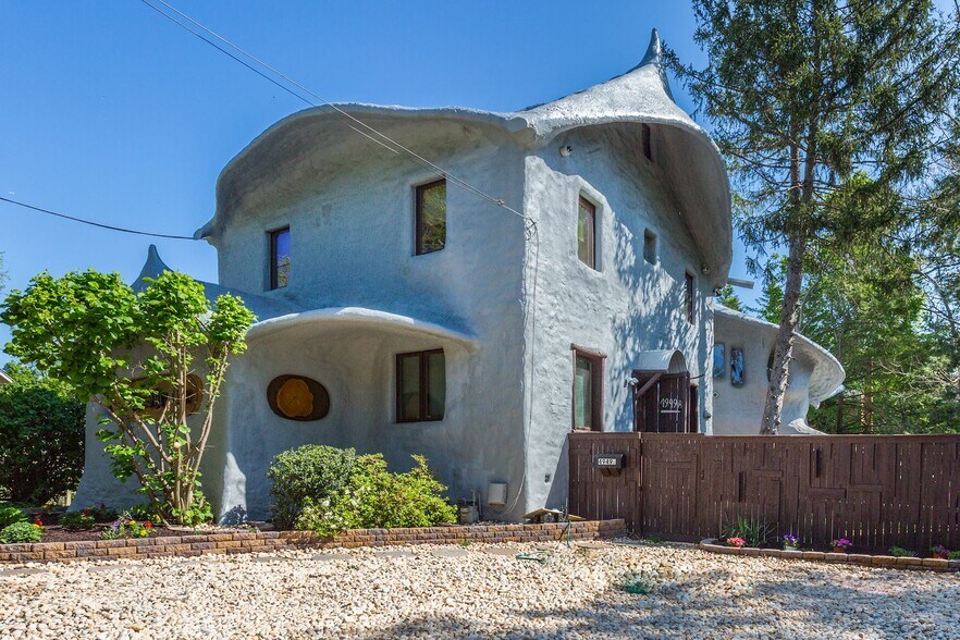 live in the famous Mushroom House; separate entrance, first floor apartment - 4949 Allan Rd