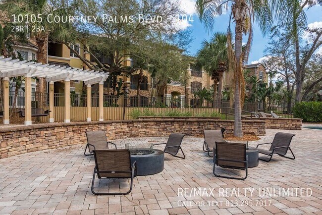 Building Photo - 10105 Courtney Palms Blvd