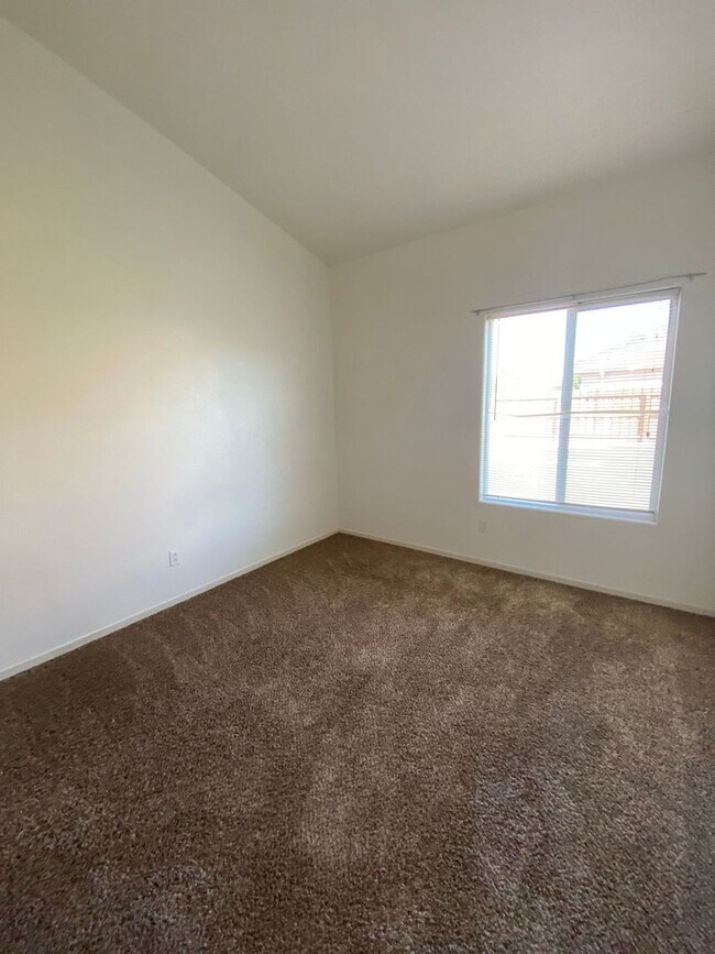 Building Photo - Large Corner Lot Home with Landscaping included!