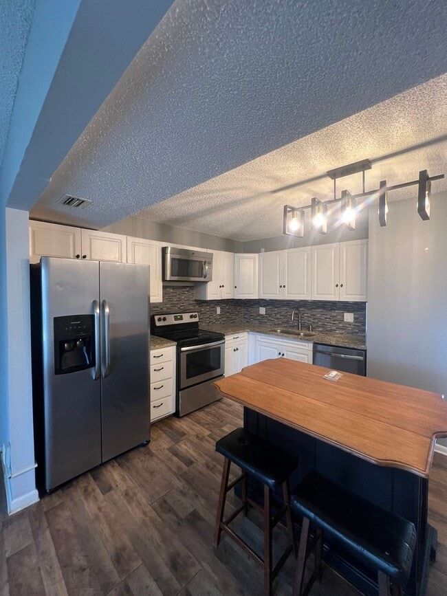 Building Photo - Updated Sanford Condo with Private Patio & Community Pool Near Downtown!