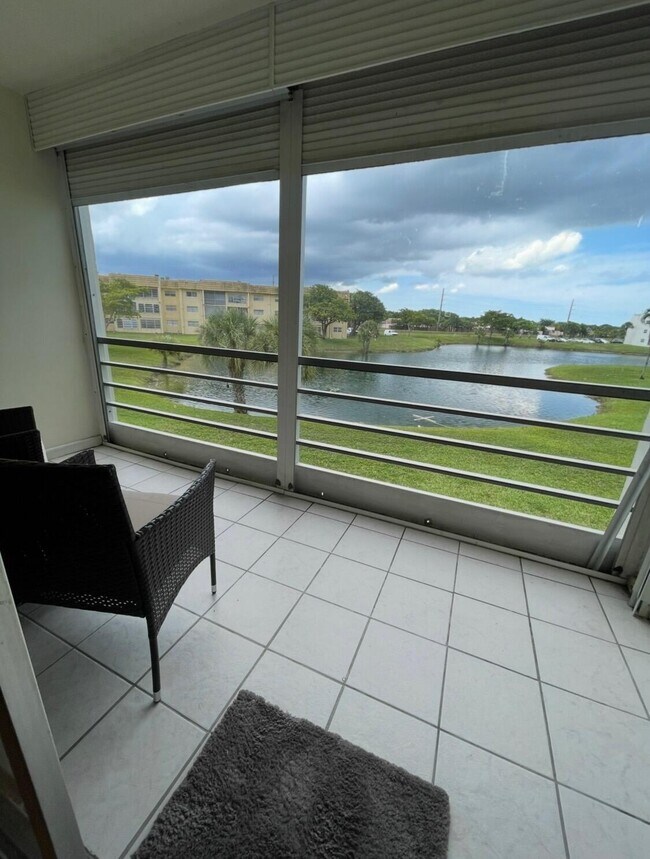 Building Photo - 8350 Sunrise Lakes Blvd